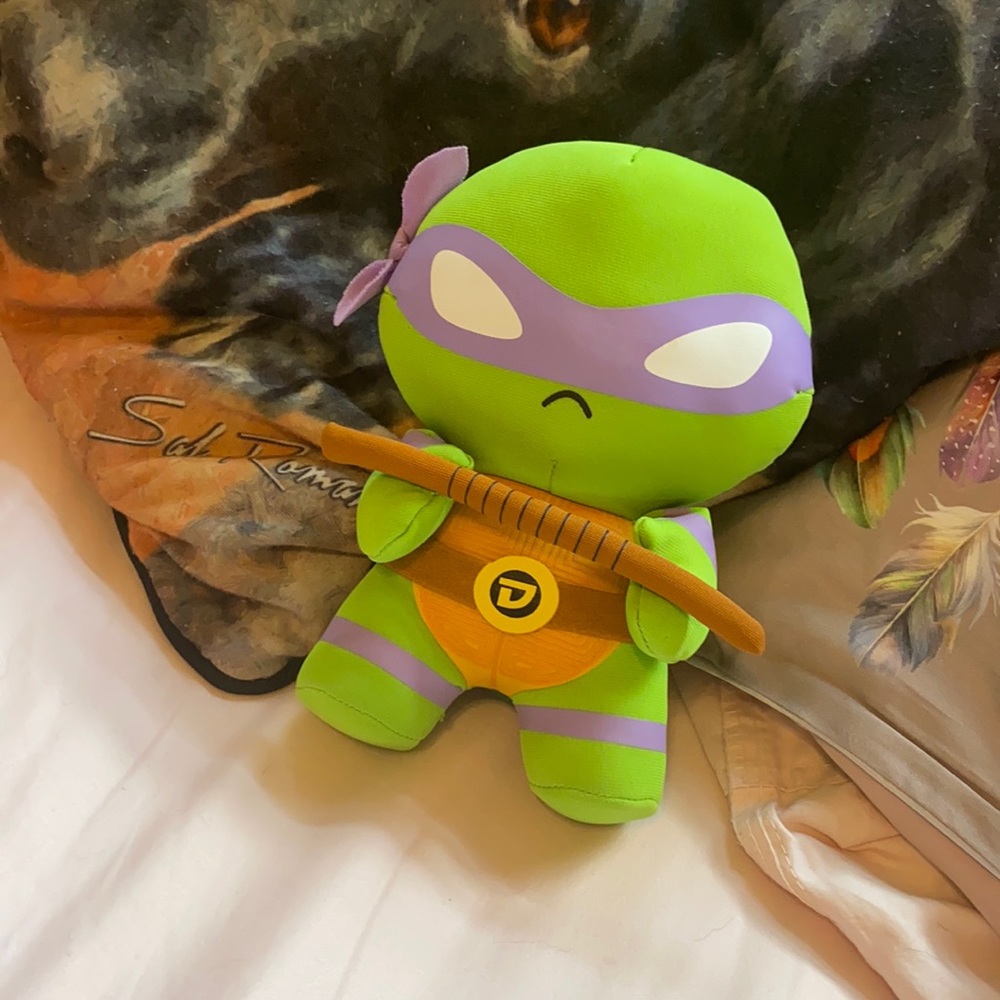 I am selling a ninja turtle with a purple mask